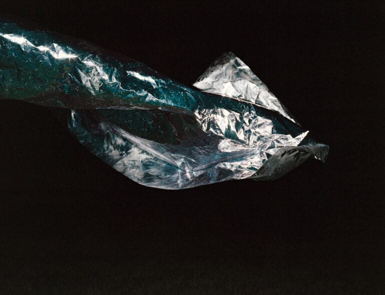 Star mapping: a shiny silver squid-like shape floats against a black sky