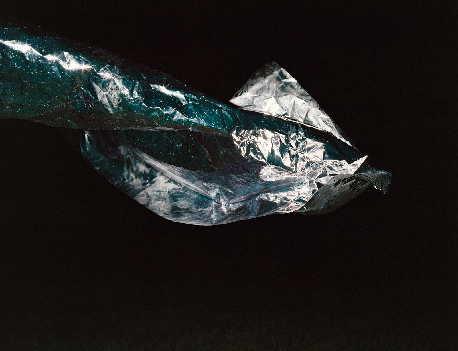 Star mapping: a shiny silver squid-like shape floats against a black sky